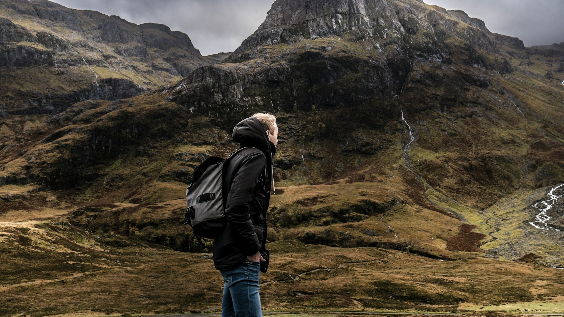 Owning Scotch casks can be daunting especially for first-timers. Man hiking in Scotland's Glencoe